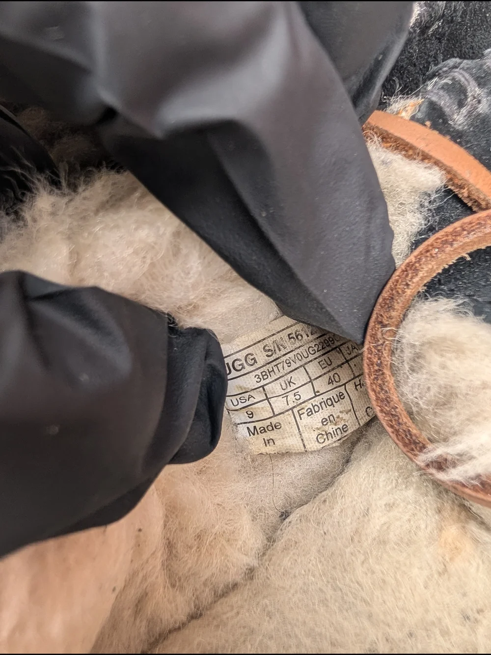 UGG Black Suede Shearling Moccasin Slippers with Chestnut Trim
